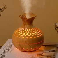 Коричневий аромадифузор ViO з підсвіткою на столі